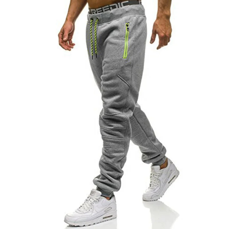 Calça Moletom Masculina para Esportes RZ316 em algodão premium, com zíper nos bolsos e design ajustável. Perfeita para treinos e estilo no dia a dia.