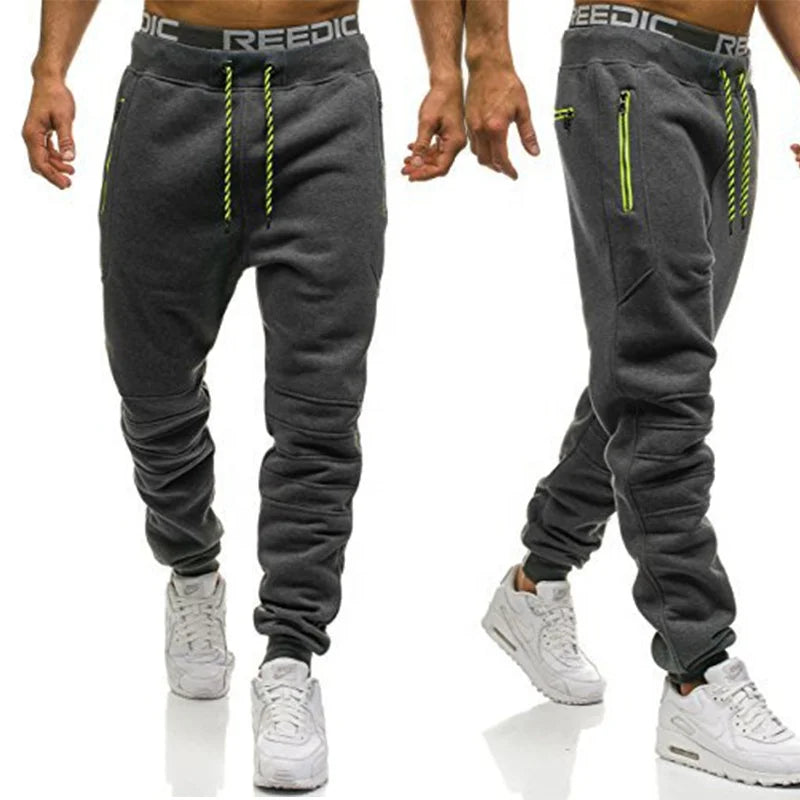 Calça Moletom Masculina para Esportes RZ316 em algodão premium, com zíper nos bolsos e design ajustável. Perfeita para treinos e estilo no dia a dia.