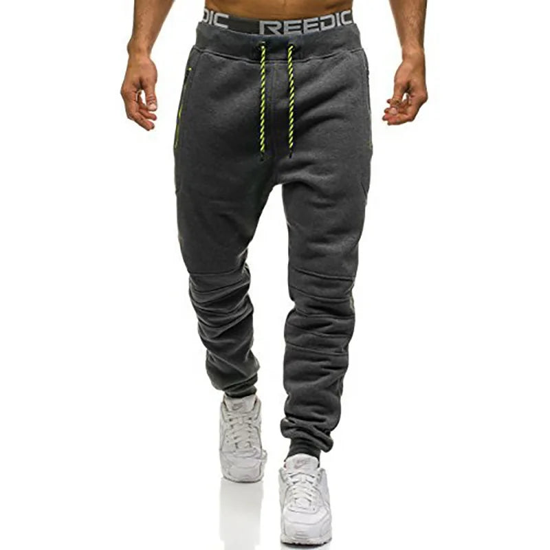 Calça Moletom Masculina para Esportes RZ316 em algodão premium, com zíper nos bolsos e design ajustável. Perfeita para treinos e estilo no dia a dia.