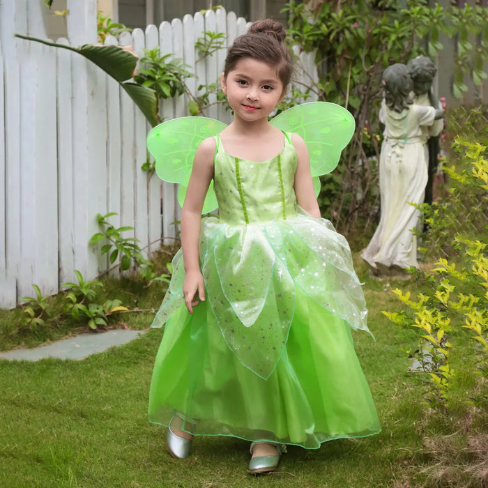 Fantasia Infantil Fada Verde Encantada com vestido, asas, luvas, coroa, colar e brincos, perfeita para festas infantis e brincadeiras mágicas.