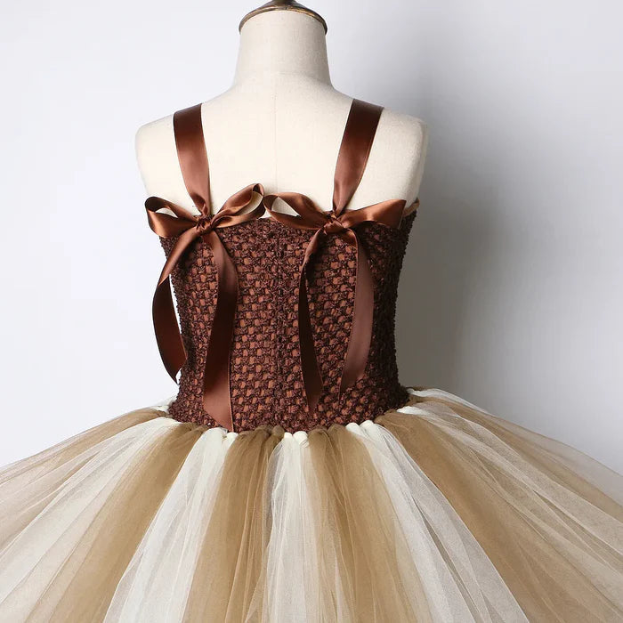 Fantasia Infantil Girafinha feita em poliéster e nylon, com design temático inspirado na girafa, ideal para festas infantis e brincadeiras mágicas.