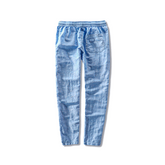 Calça de Linho Masculina Romenzi RZ567 em detalhe, calça leve em linho de alta qualidade que oferece frescor, conforto e estilo atemporal.
