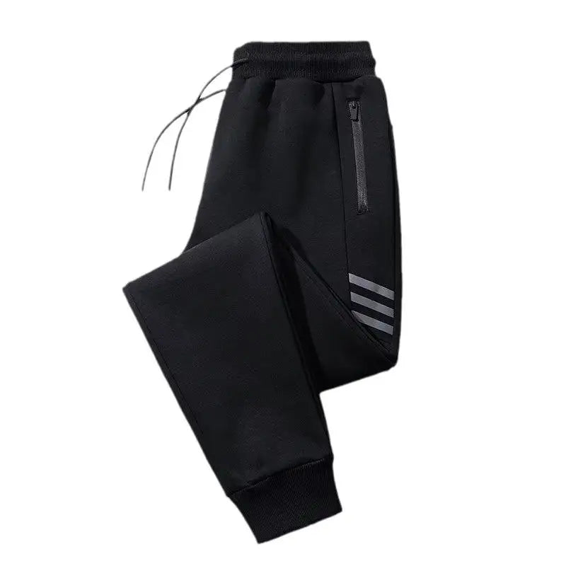 Calça de moletom masculina esportiva, com bolsos com zíper e cós ajustável. Ideal para atividades físicas, como corrida e academia.