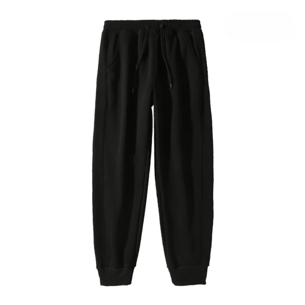 Calça moletom masculina feita em algodão premium, com bolsos, ajuste solto e cintura elástica. Ideal para praticidade e conforto no dia a dia.