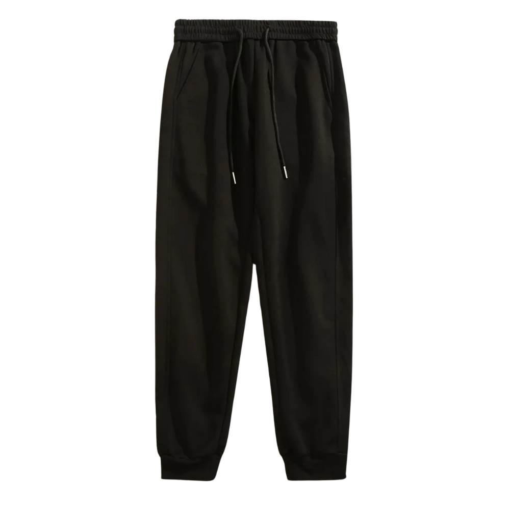 Calça moletom masculina em algodão premium, com design jogger, elástico na cintura e bolsos espaçosos. Ideal para conforto e estilo moderno.