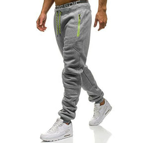 Calça Moletom Masculina para Esportes RZ316 em algodão premium, com zíper nos bolsos e design ajustável. Perfeita para treinos e estilo no dia a dia.