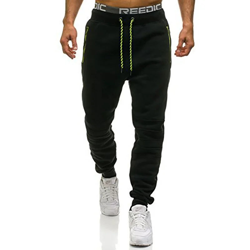 Calça Moletom Masculina para Esportes RZ316 em algodão premium, com zíper nos bolsos e design ajustável. Perfeita para treinos e estilo no dia a dia.