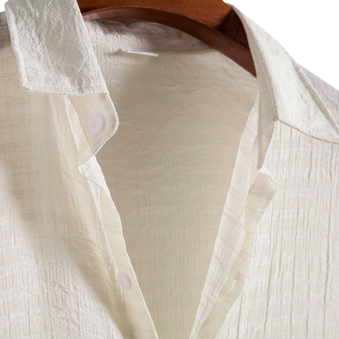 Camisa Manga Curta Romenzi Playa Off White RZ591 em tecido leve, com design sofisticado e caimento impecável para ocasiões casuais e dias ensolarados.