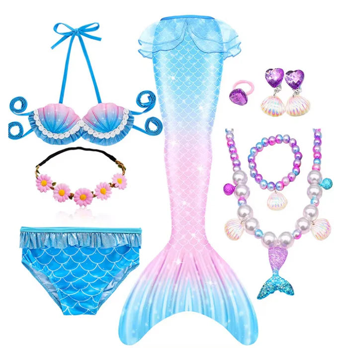 Fantasia Infantil Cauda de Sereia com cauda, biquíni, tiara de flores e acessórios, perfeita para festas infantis e brincadeiras mágicas.