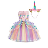 Fantasia Infantil Unicórnio com vestido, arquinho e asa em poliéster, algodão e tule, perfeita para festas, brincadeiras e momentos encantados.