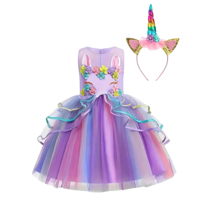 Fantasia Infantil Unicórnio com vestido, arquinho e asa em poliéster, algodão e tule, perfeita para festas, brincadeiras e momentos encantados.