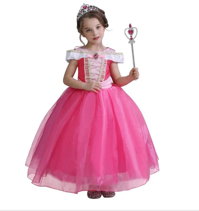 Fantasia Infantil Vestido Princesa de Baile Rosa com vestido, coroa e varinha, feita em viscose e poliéster para festas, brincadeiras e momentos mágicos.