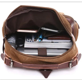 Mochila Executiva de Lona com detalhes em Couro Romenzi RZ069, prática e elegante, ideal para notebooks e itens essenciais.